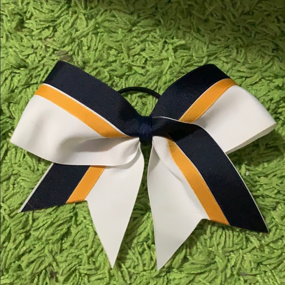 Blue gold and white cheer bow